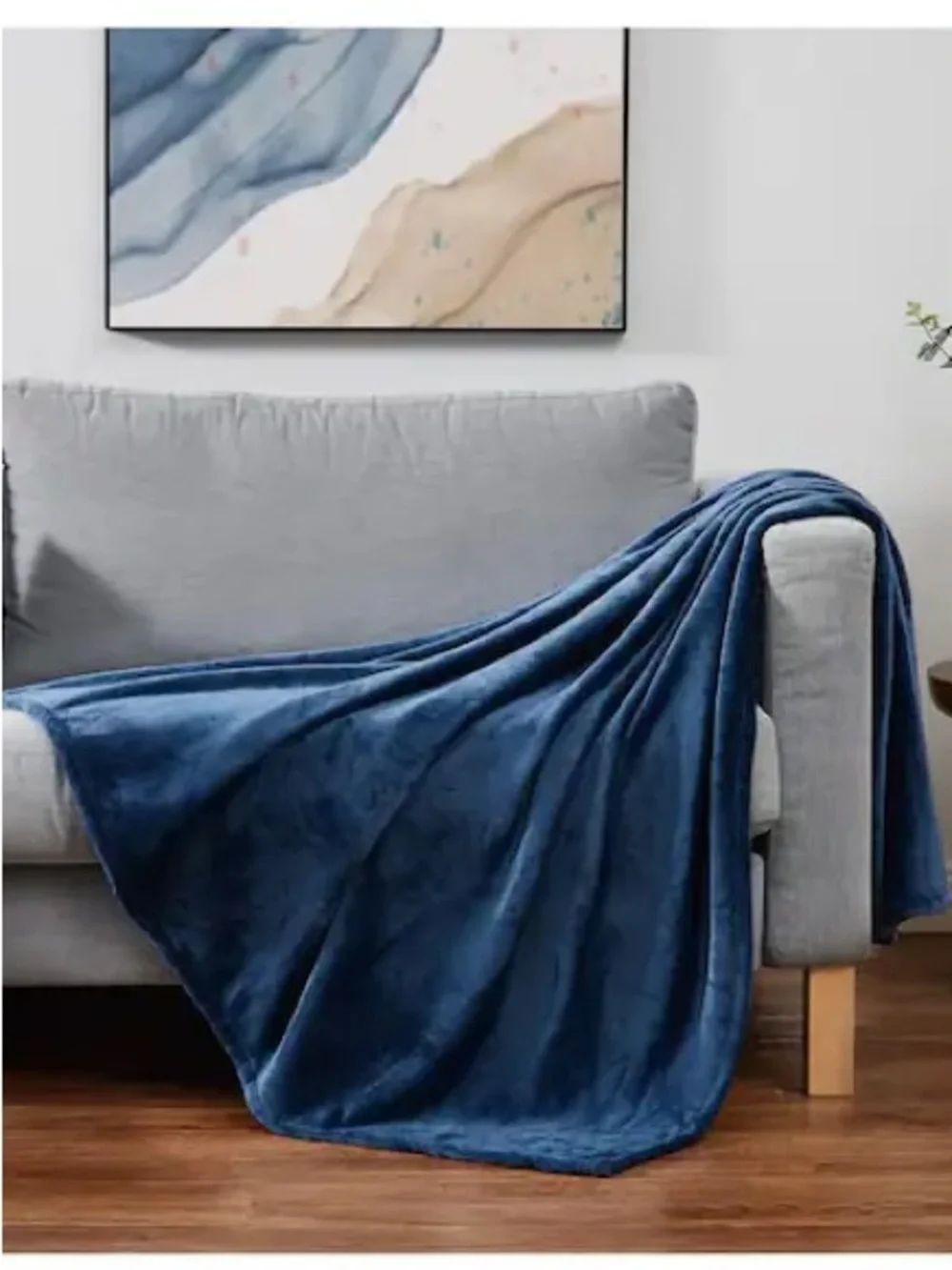 Soft, thin throw blanket. Blue.